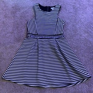 Black and white striped dress with gem belt.